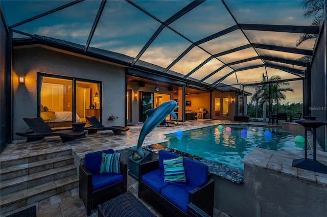 pool featuring an outdoor hangout area and a patio