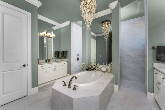 full bath featuring marble finish floor, crown molding, vanity, baseboards, and a bath