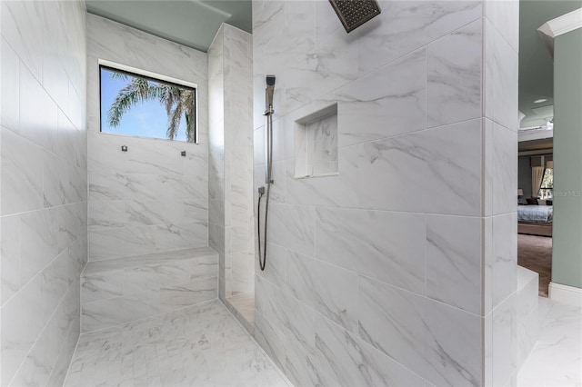 ensuite bathroom featuring ensuite bath and a marble finish shower