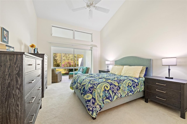 bedroom with ceiling fan, light carpet, high vaulted ceiling, and access to exterior