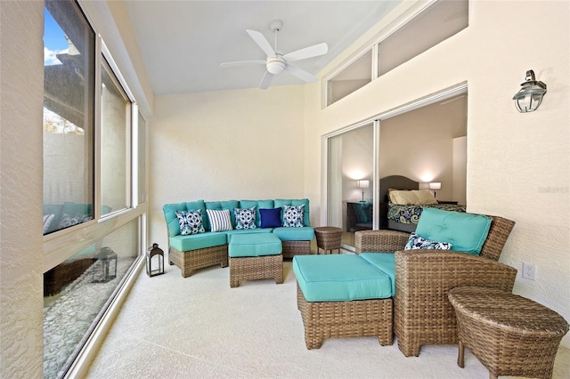 sunroom featuring plenty of natural light and ceiling fan