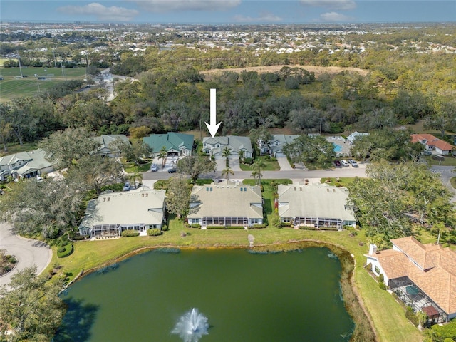 aerial view with a residential view and a water view