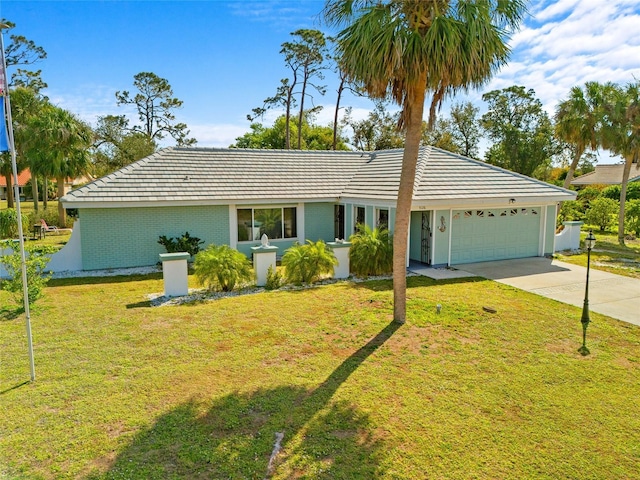 ranch-style house featuring a front lawn, driveway, a garage, brick siding, and a tiled roof