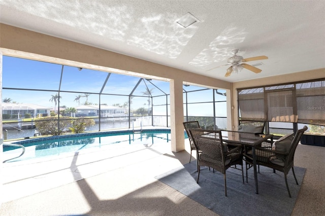 sunroom / solarium with a pool