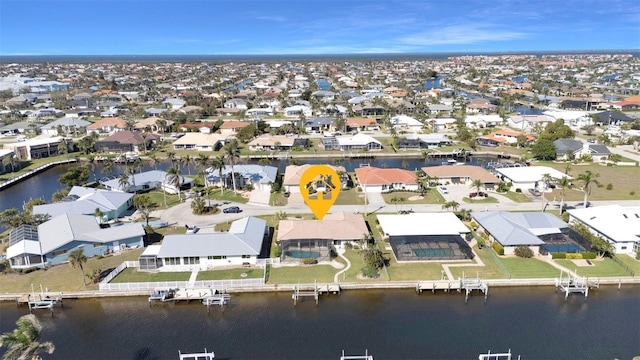 aerial view featuring a residential view and a water view