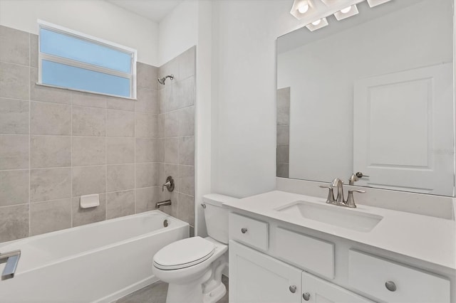 bathroom with  shower combination, vanity, and toilet