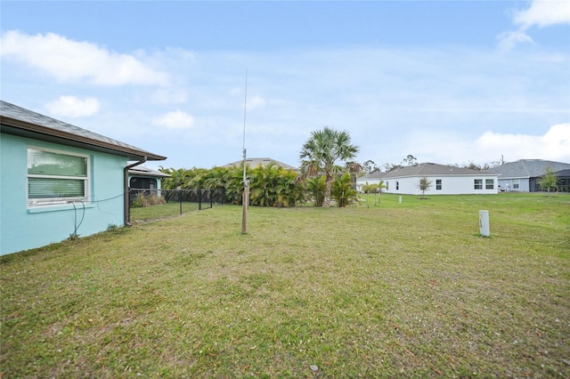 view of yard with fence