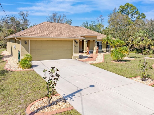 view of front of property with concrete driveway, stucco siding, roof with shingles, an attached garage, and a front yard