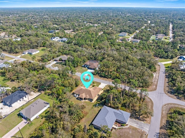 bird's eye view with a view of trees