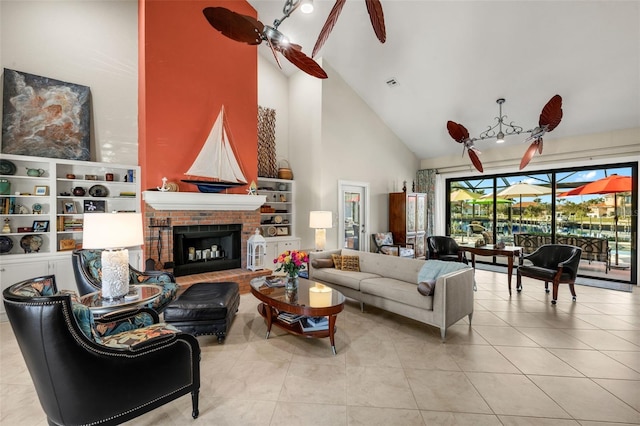 living room featuring visible vents, ceiling fan, tile patterned floors, a brick fireplace, and high vaulted ceiling