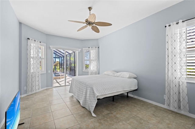 bedroom with a ceiling fan, access to outside, light tile patterned flooring, and baseboards