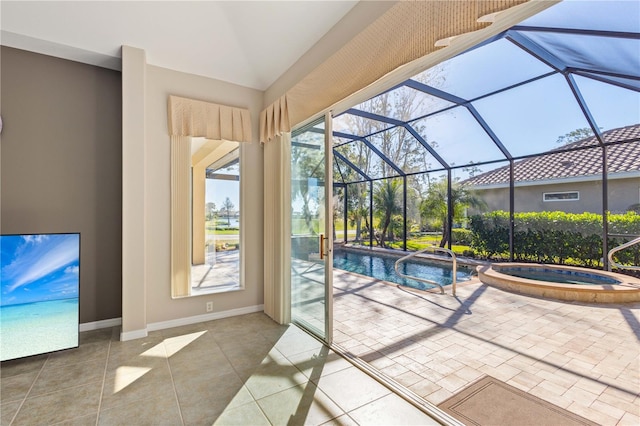 view of pool with a pool with connected hot tub