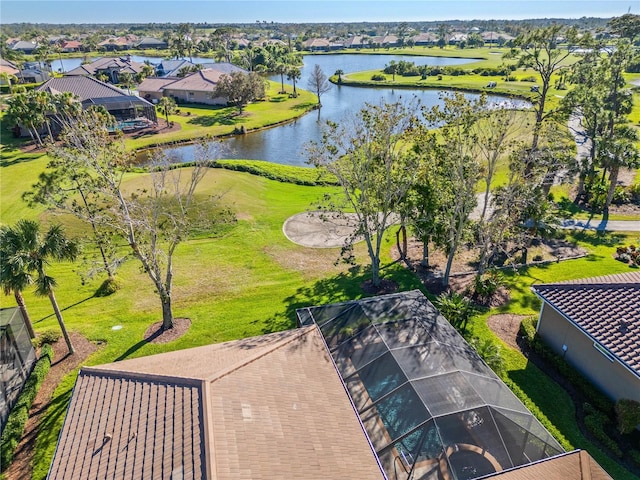 birds eye view of property with a water view and a residential view