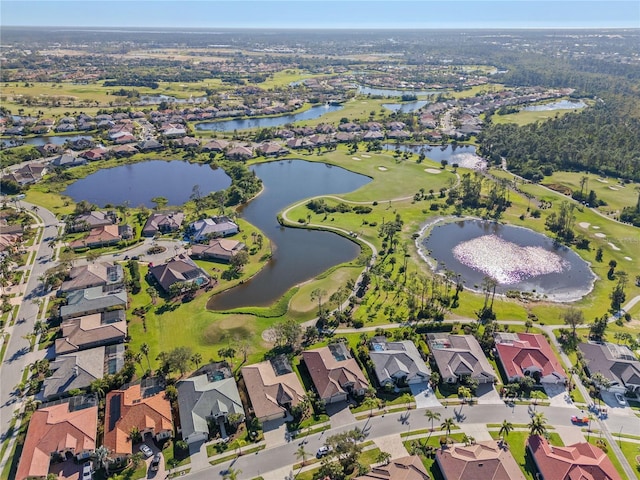 bird's eye view featuring a water view, a residential view, and golf course view