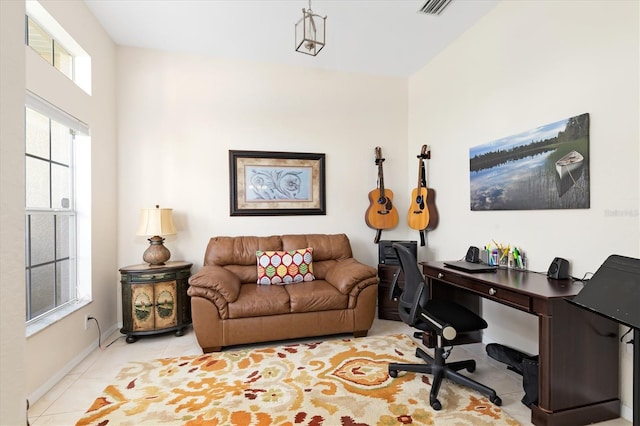 office area featuring visible vents, baseboards, and tile patterned floors