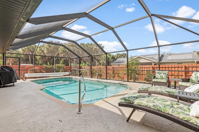 view of swimming pool with a fenced in pool, grilling area, glass enclosure, a patio area, and a fenced backyard