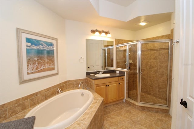 full bath with tile patterned floors, a shower stall, a bath, and vanity