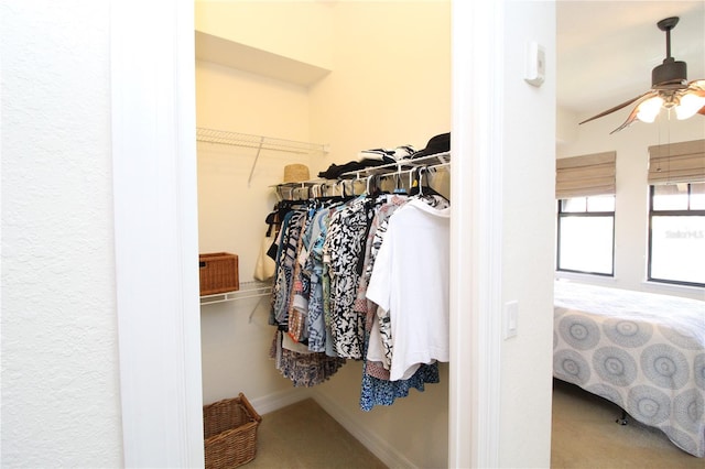 spacious closet featuring a ceiling fan