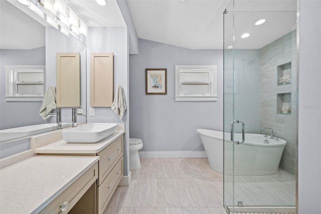 full bath with recessed lighting, a soaking tub, vanity, a shower stall, and baseboards