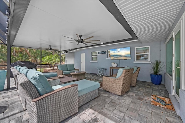 view of patio featuring ceiling fan and an outdoor hangout area