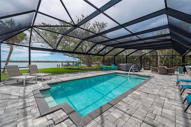 view of pool featuring a patio, a water view, a hot tub, a lanai, and an outdoor living space