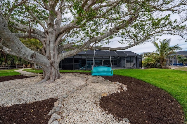 view of yard with a lanai