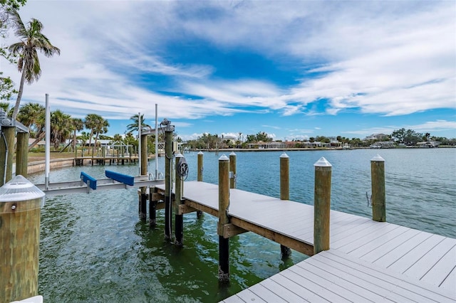 view of dock featuring a water view and boat lift