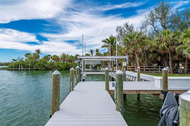 dock area featuring a water view and boat lift