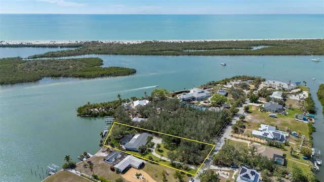 drone / aerial view with a water view