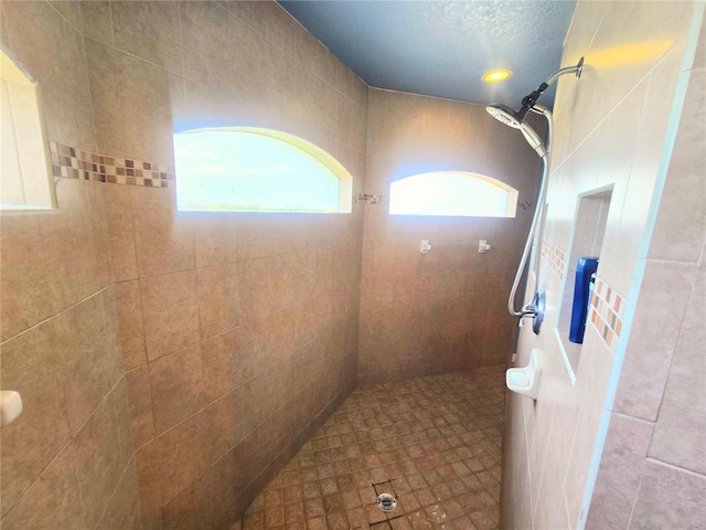 interior space featuring a tile shower