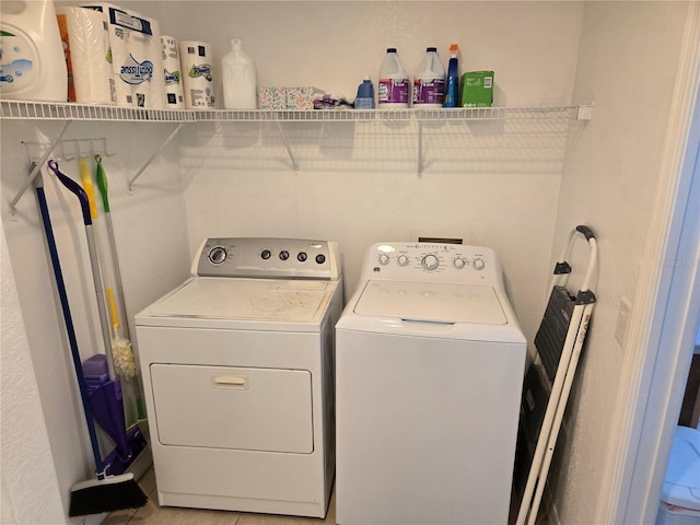 washroom with laundry area and separate washer and dryer