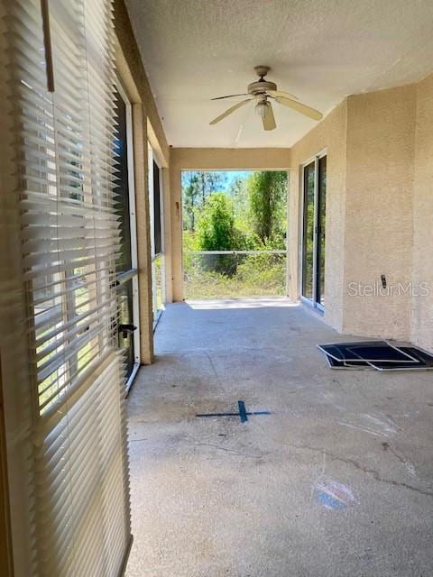 view of patio with ceiling fan