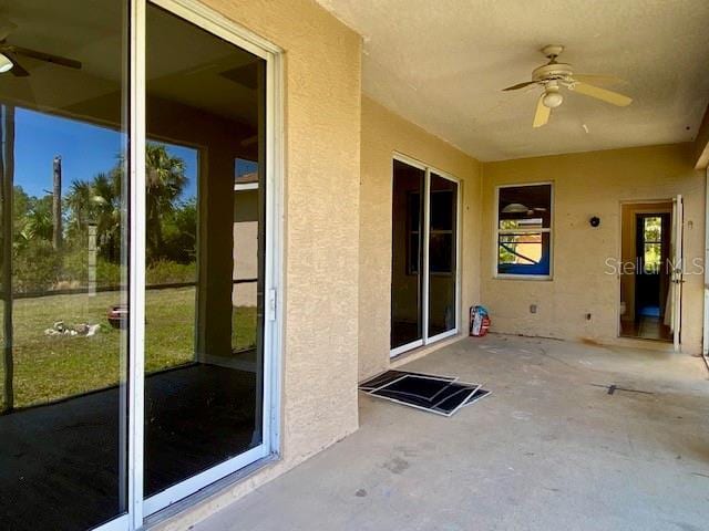 view of patio / terrace featuring a ceiling fan