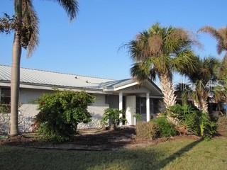 view of home's exterior featuring metal roof