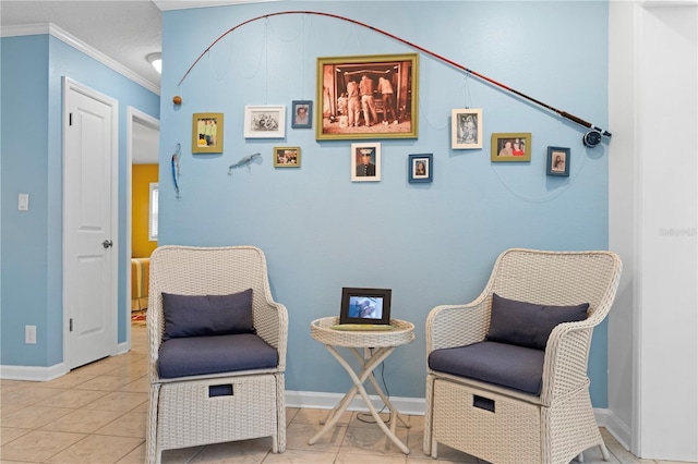 living area featuring baseboards, ornamental molding, and tile patterned floors