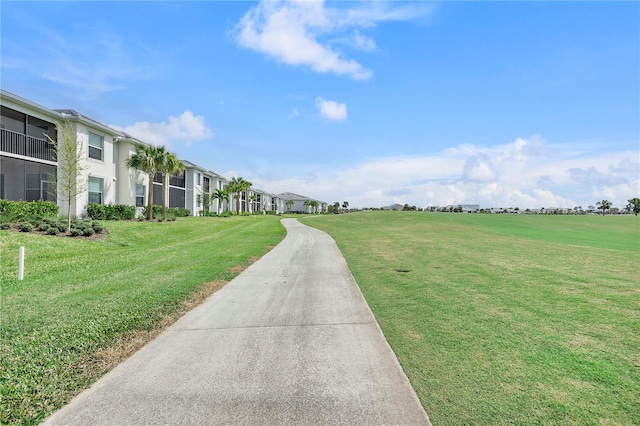 view of home's community featuring a yard