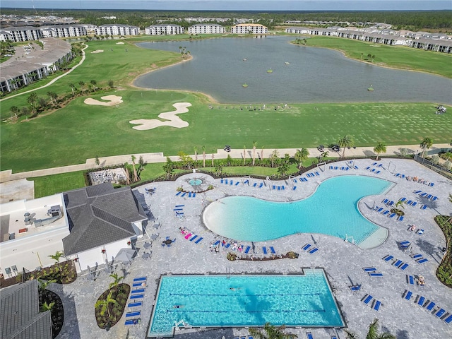 bird's eye view with golf course view and a water view