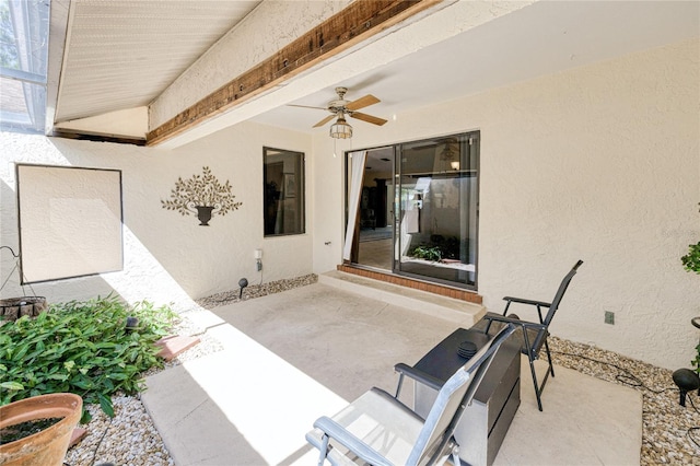 view of patio with a ceiling fan