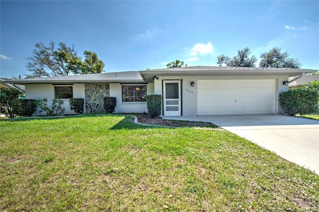 single story home featuring a garage, driveway, a front lawn, and stucco siding