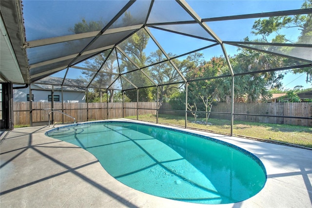 view of swimming pool featuring a fenced in pool, a fenced backyard, and a patio