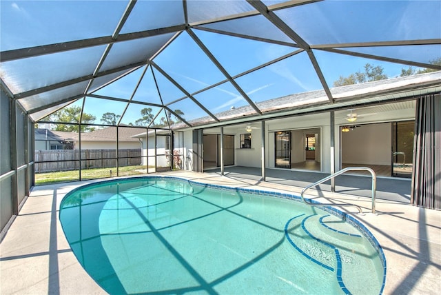 view of pool with a patio area, a lanai, and a fenced in pool