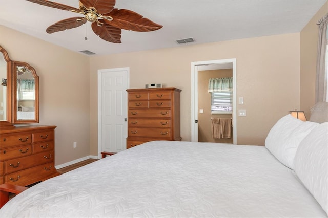 bedroom featuring visible vents, baseboards, and a ceiling fan