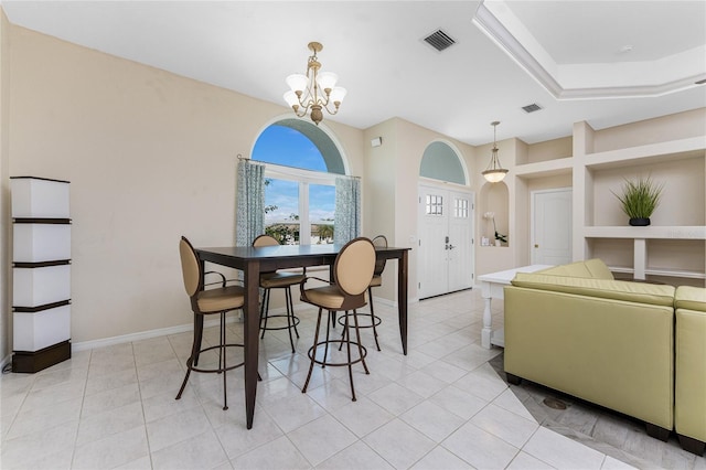 dining room featuring visible vents, a notable chandelier, baseboards, and light tile patterned floors