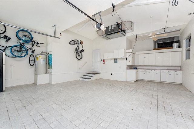 garage featuring a garage door opener and electric water heater