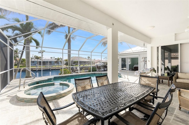 view of patio / terrace with outdoor dining area, a water view, a lanai, and a pool with connected hot tub