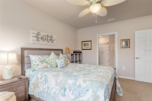 carpeted bedroom with a ceiling fan, visible vents, and baseboards