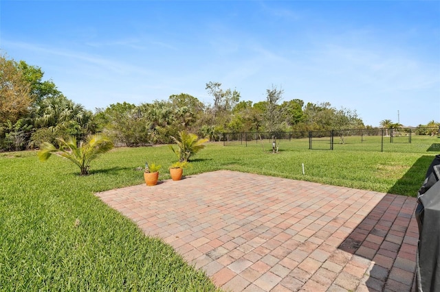 view of patio featuring fence