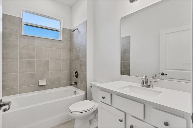 full bath with bathtub / shower combination, vanity, and toilet