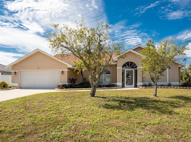 ranch-style house with a garage, concrete driveway, a front yard, and stucco siding