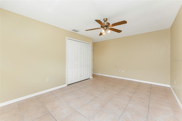 16571 Cape Horn Blvd, Punta Gorda, FL 33955 - unfurnished bedroom with light tile patterned floors, baseboards, visible vents, and a closet